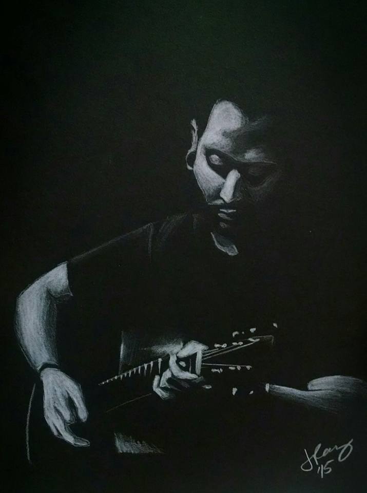 White pencil portrait of a hispanic guitar player on black paper.
